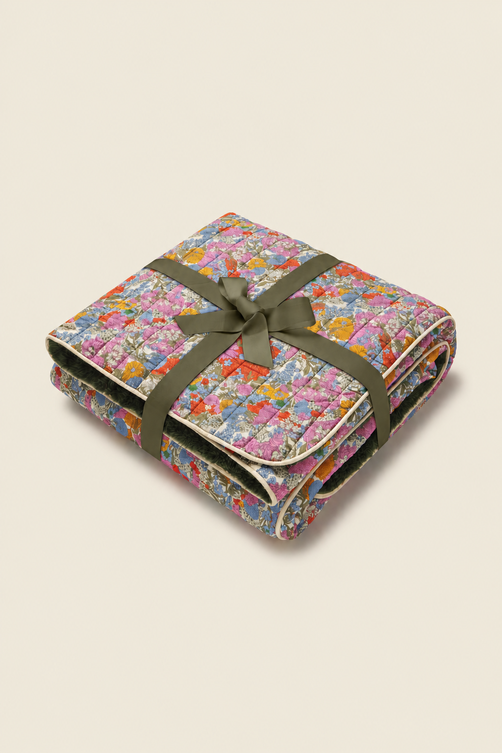 Trovata Delicate Tilia printed throw blanket — gift-wrapped with an olive ribbon
